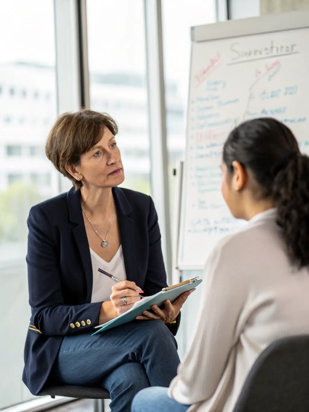 A person receiving one-on-one coaching, looking empowered and focused.